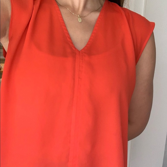 Orange Sleeveless Blouse with Asymmetrical Hem - Picture 2 of 7